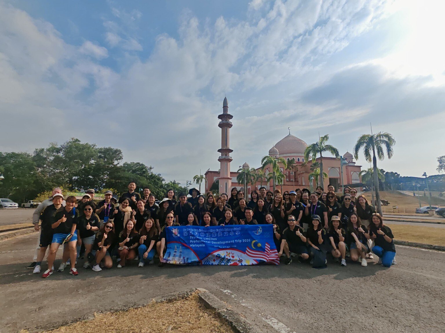 Hari-Hari group visiting a local landmark in Sabah